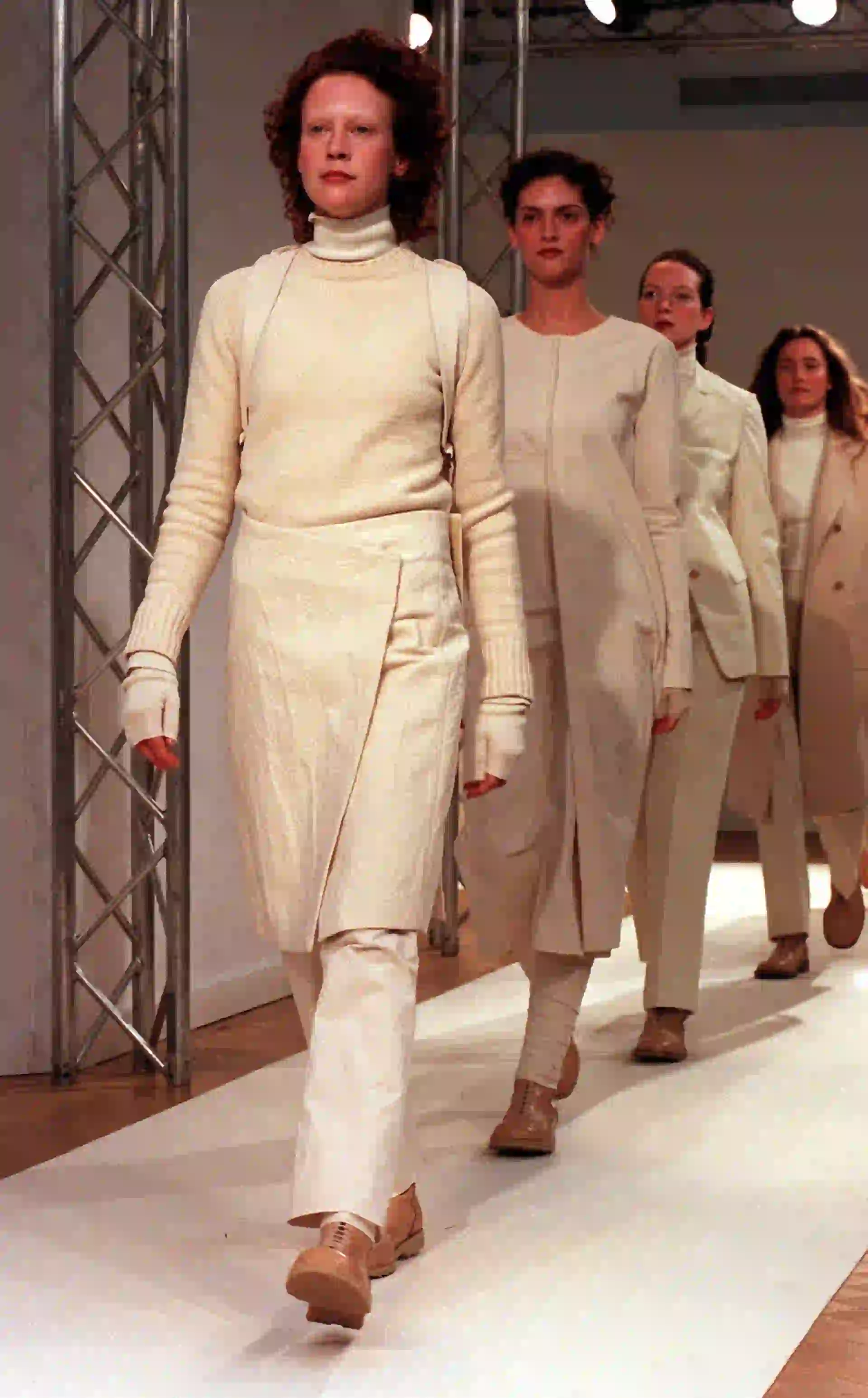 A line of models on the catwalk during the presentation of the new Burberry collection as part of London Fashion Week. (Photo by Neil Munns - PA Images/PA Images via Getty Images)