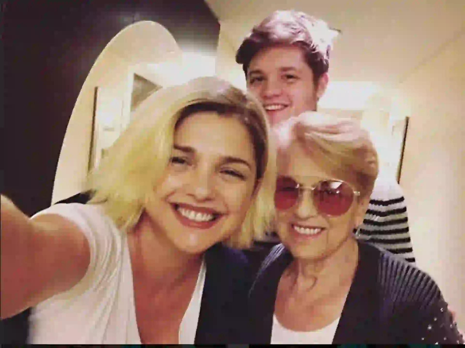  Junto a su mamá y Tomás. 