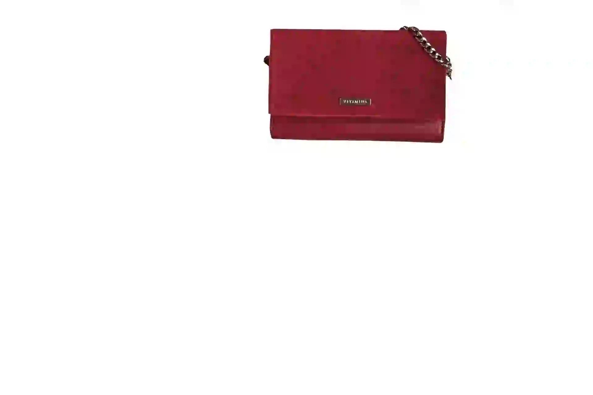 Minicartera de gamuza ($ 2.900, Vitamina).