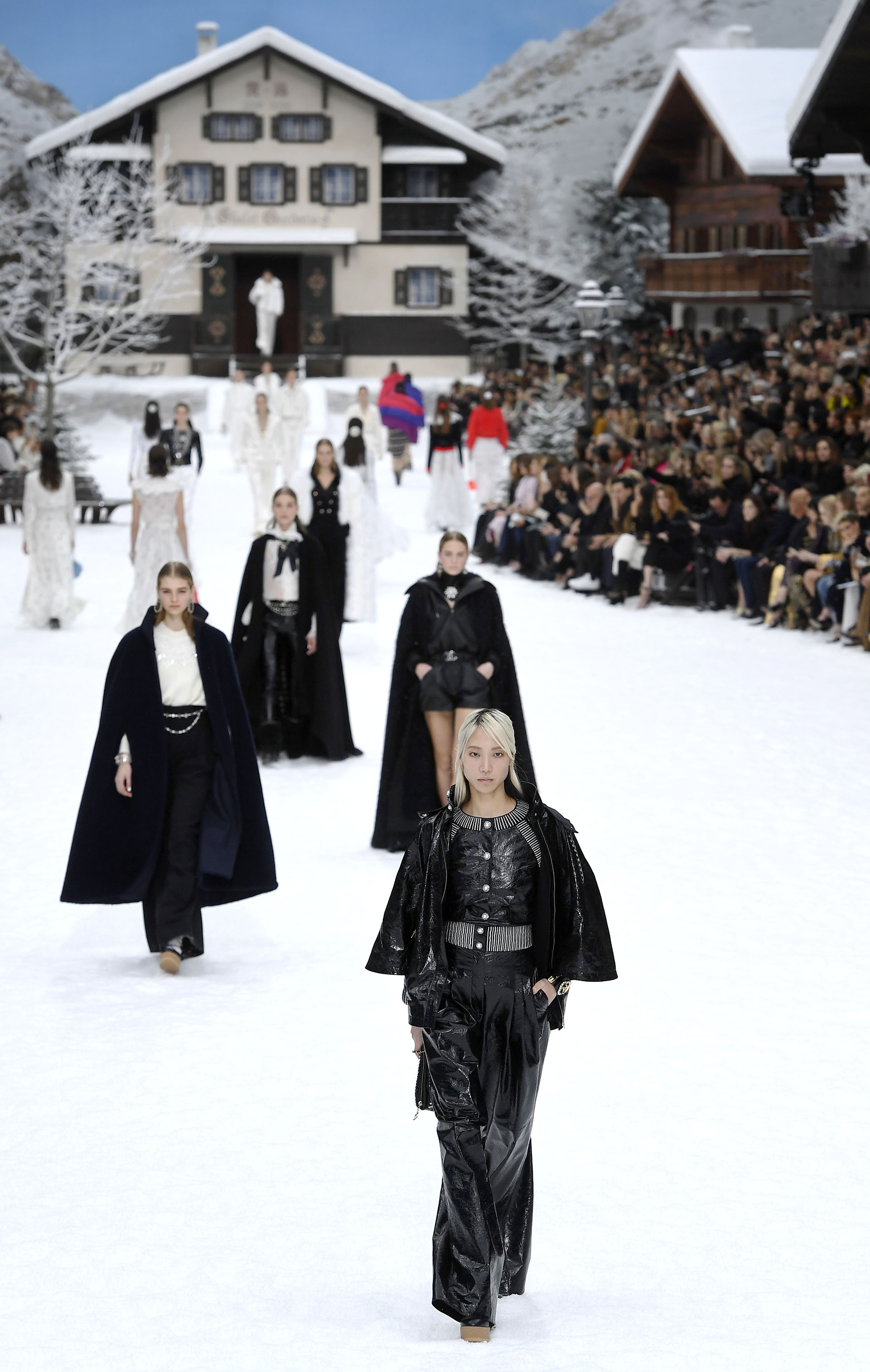 Models present creations by Chanel during the Women