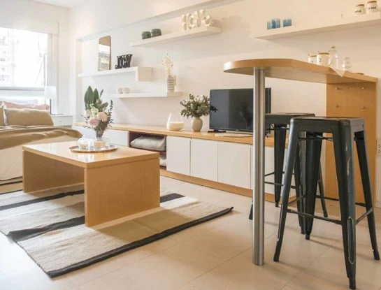 7 ideas y más trucos para decorar un monoambiente (y ganar espacio)