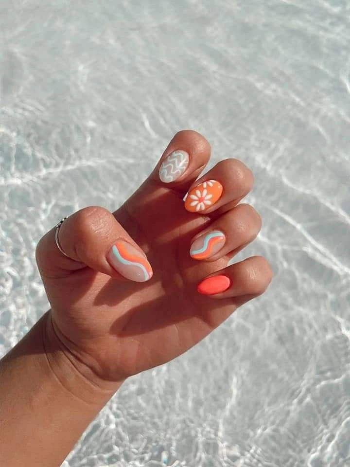 tendencia en anil art 2023, uñas orange