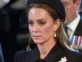 Kate Middleton con el broche de la reina