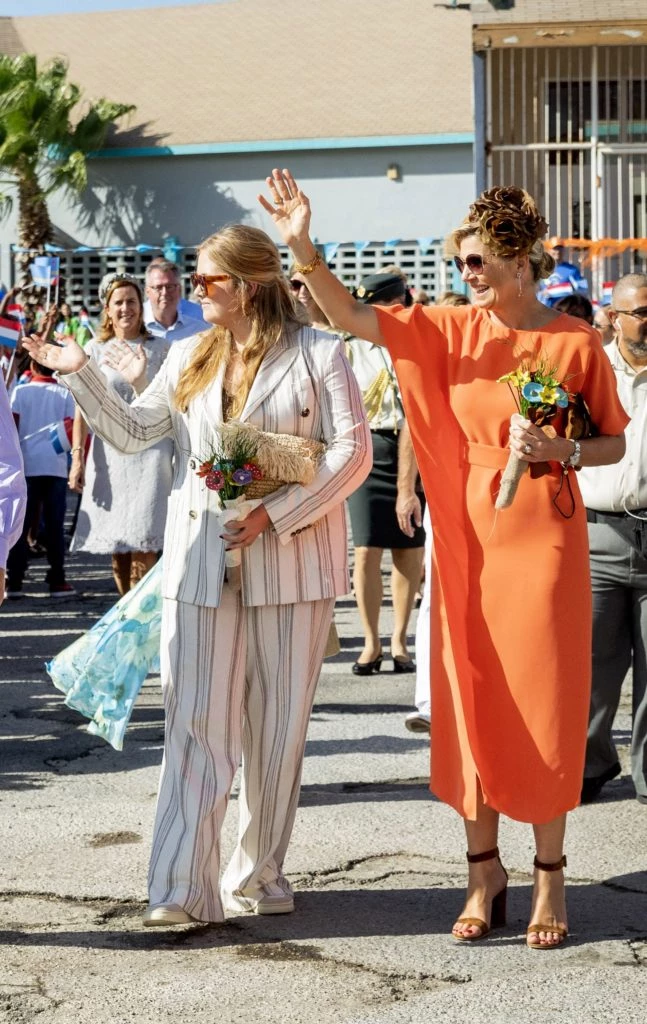 Máxima Zorreguieta en rojo y en naranja