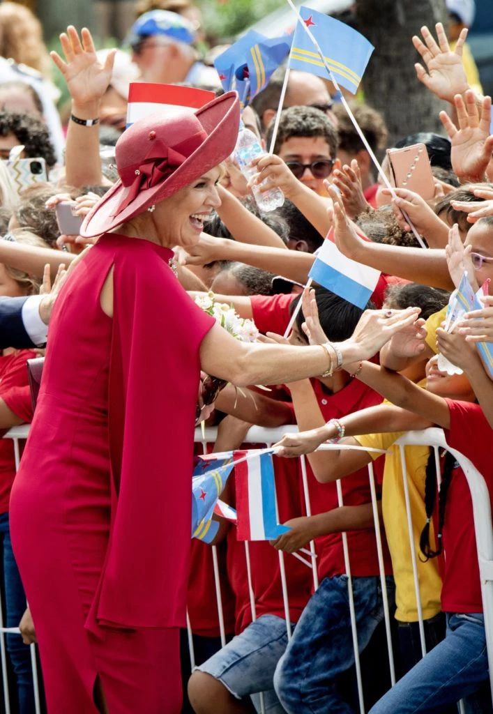 Máxima Zorreguieta en rojo y en naranja