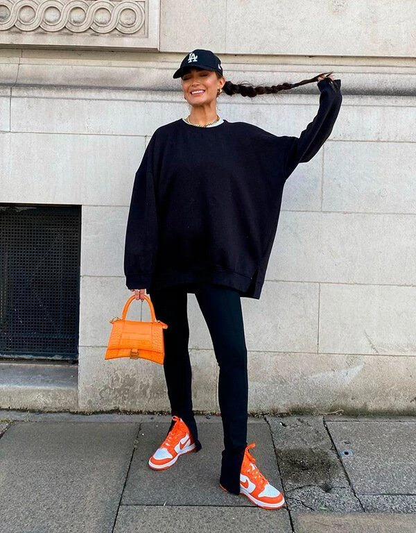 Los mejores looks para armar con un suéter negro