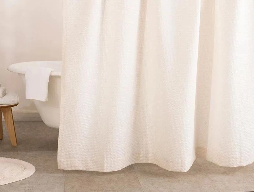 Cómo limpiar y blanquear la cortina de baño