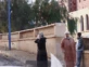Mujeres musulmanas acompañadas de hombres en la calle