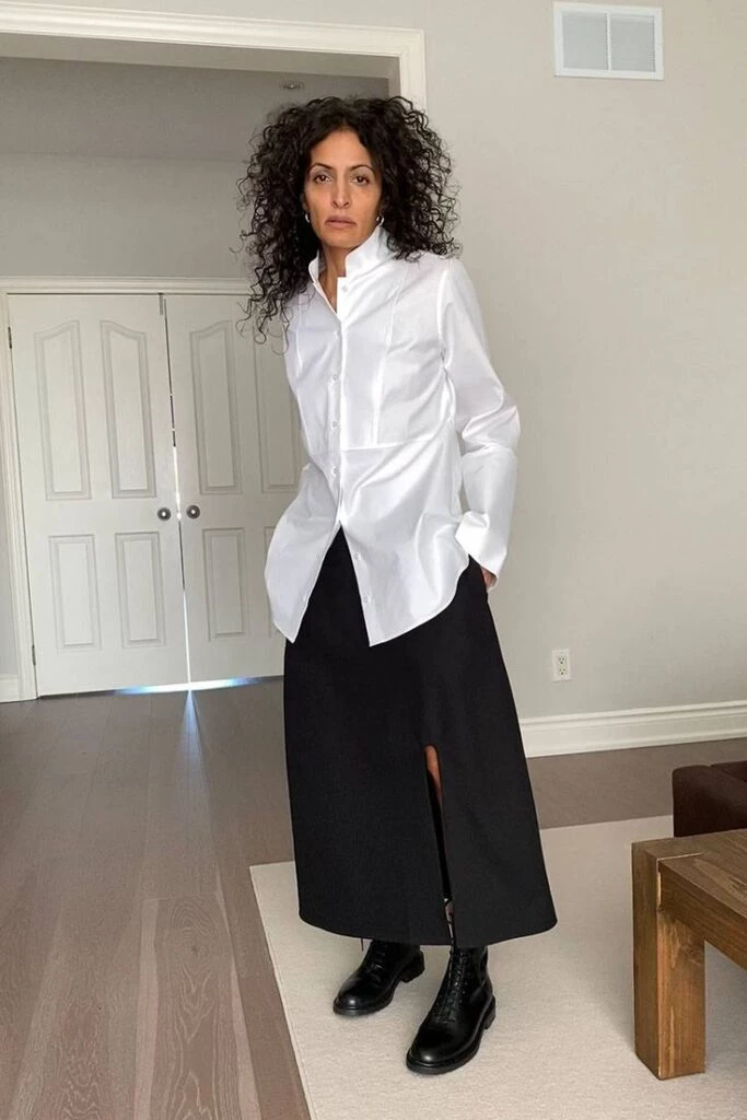 flada negra con camisa blanca