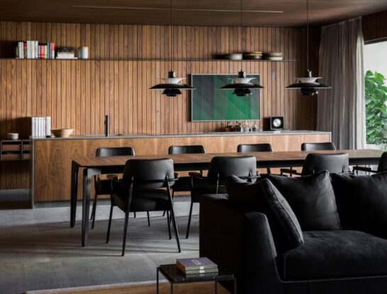 Un departamento masculino y elegante con aires retro