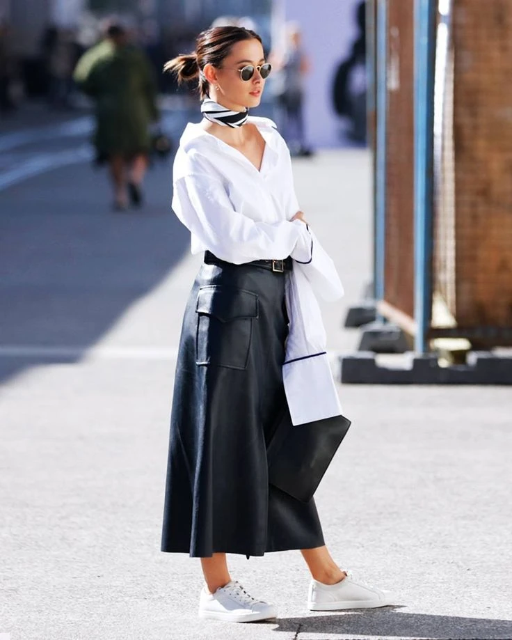 Guía de estilo: comó llevar las faldas midis negras, la prenda más elegida este invierno 2024