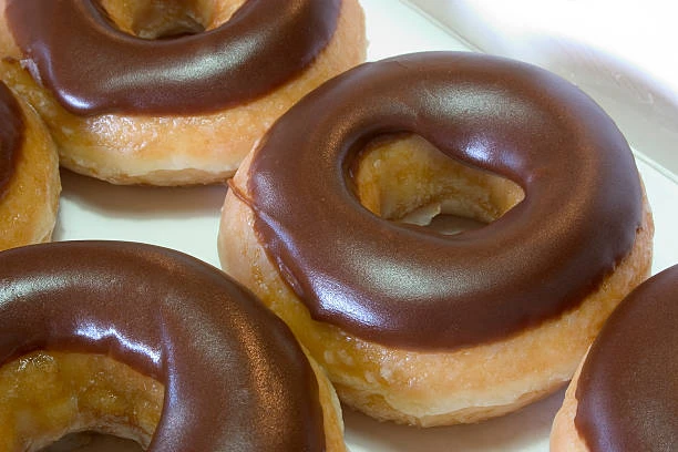 Donas bañadas en chocolate: la receta ideal para un día de lluvia