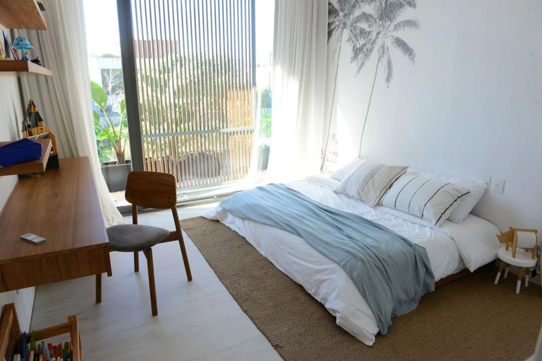 Un cuarto para jóvenes fresco con inspiración marina. 