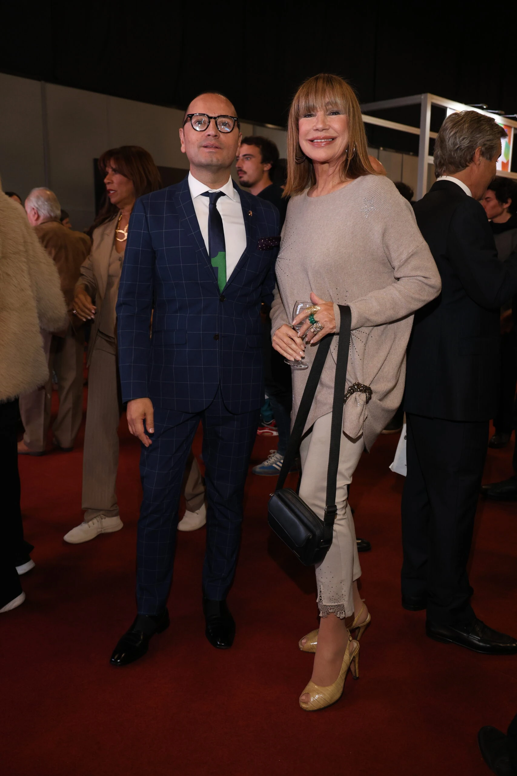 Fabián Medina Flores y Mora Furtado en la presentación del libro de Alejandro G. Roemmers