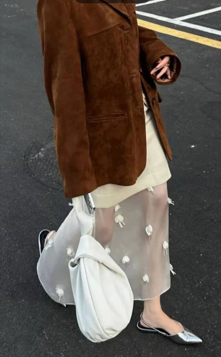 9 looks de media estación con las tendencias del street style europeo