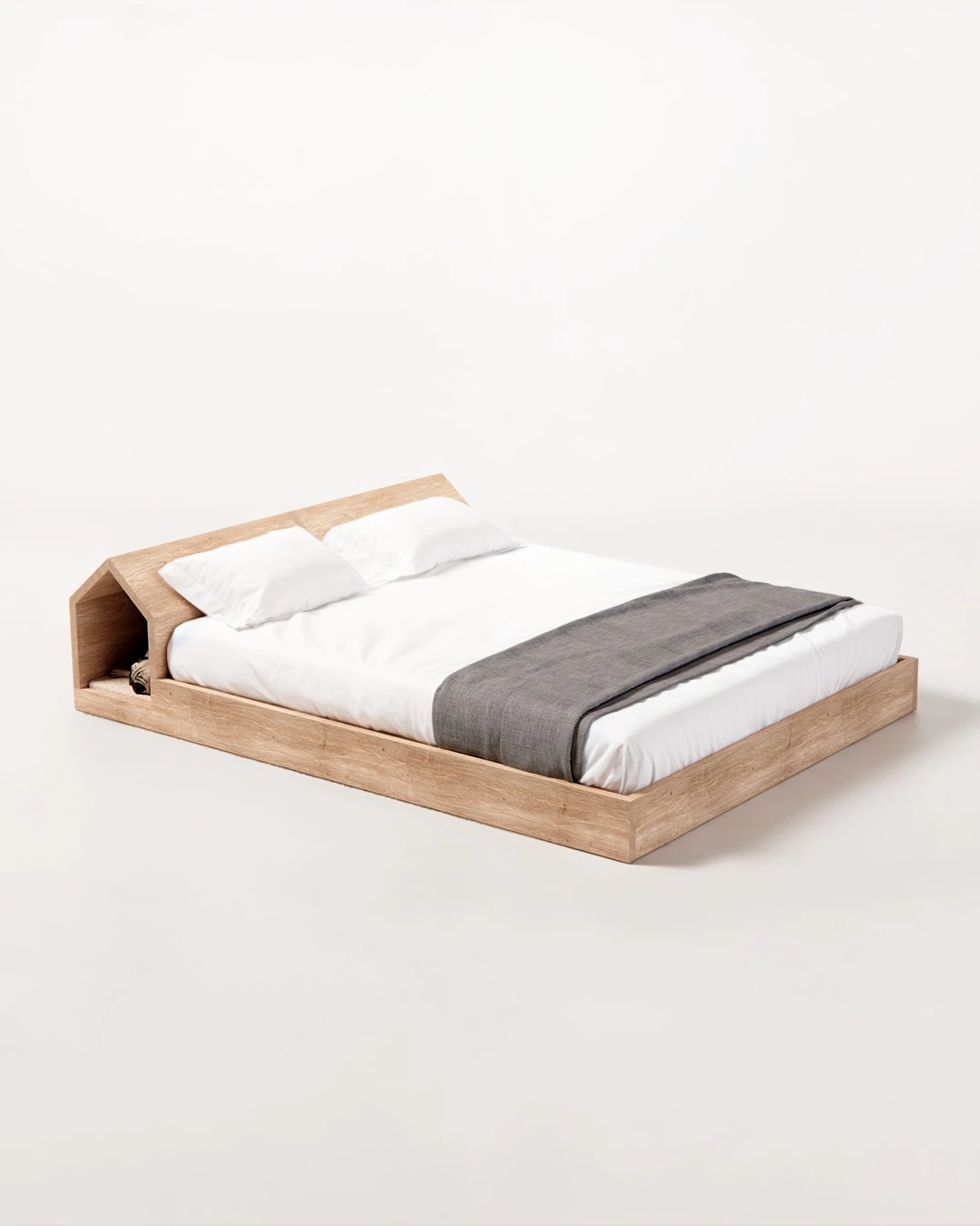Dog Hut Bed es la cama de diseño perfecta para dormir junto a tu perro. 
