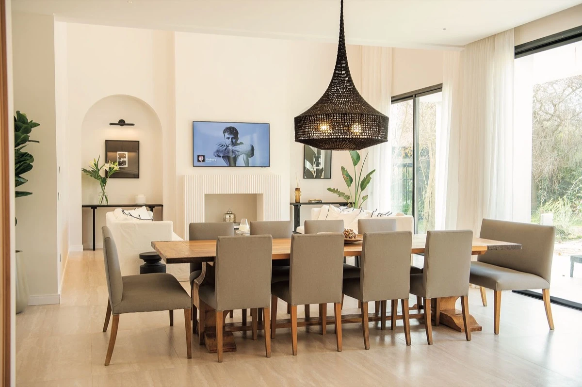 Living, comedor y cocina se reúnen en un gran espacio de concepto abierto