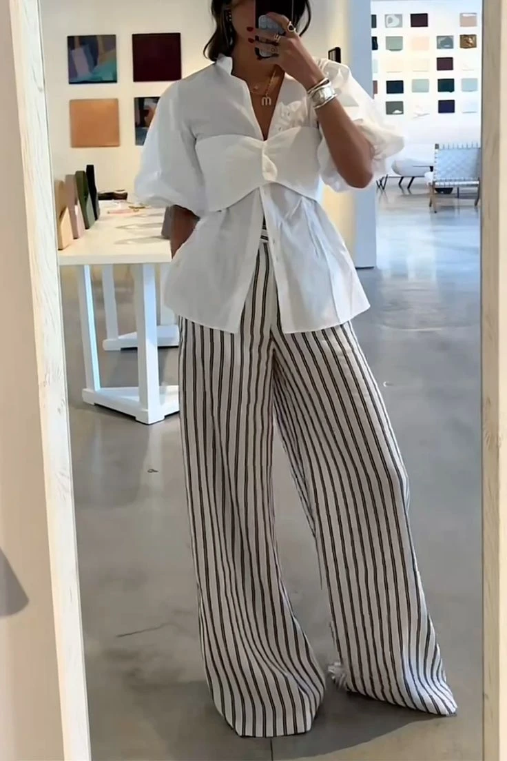 Palazzos, jeans anchos y flats: los looks effortless ideales para las fiestas