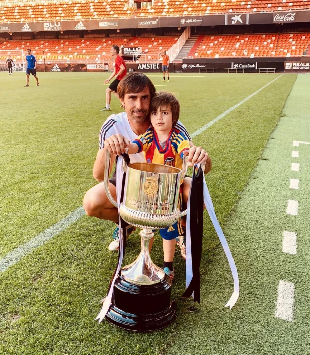 El entrenador con uno de sus hijos