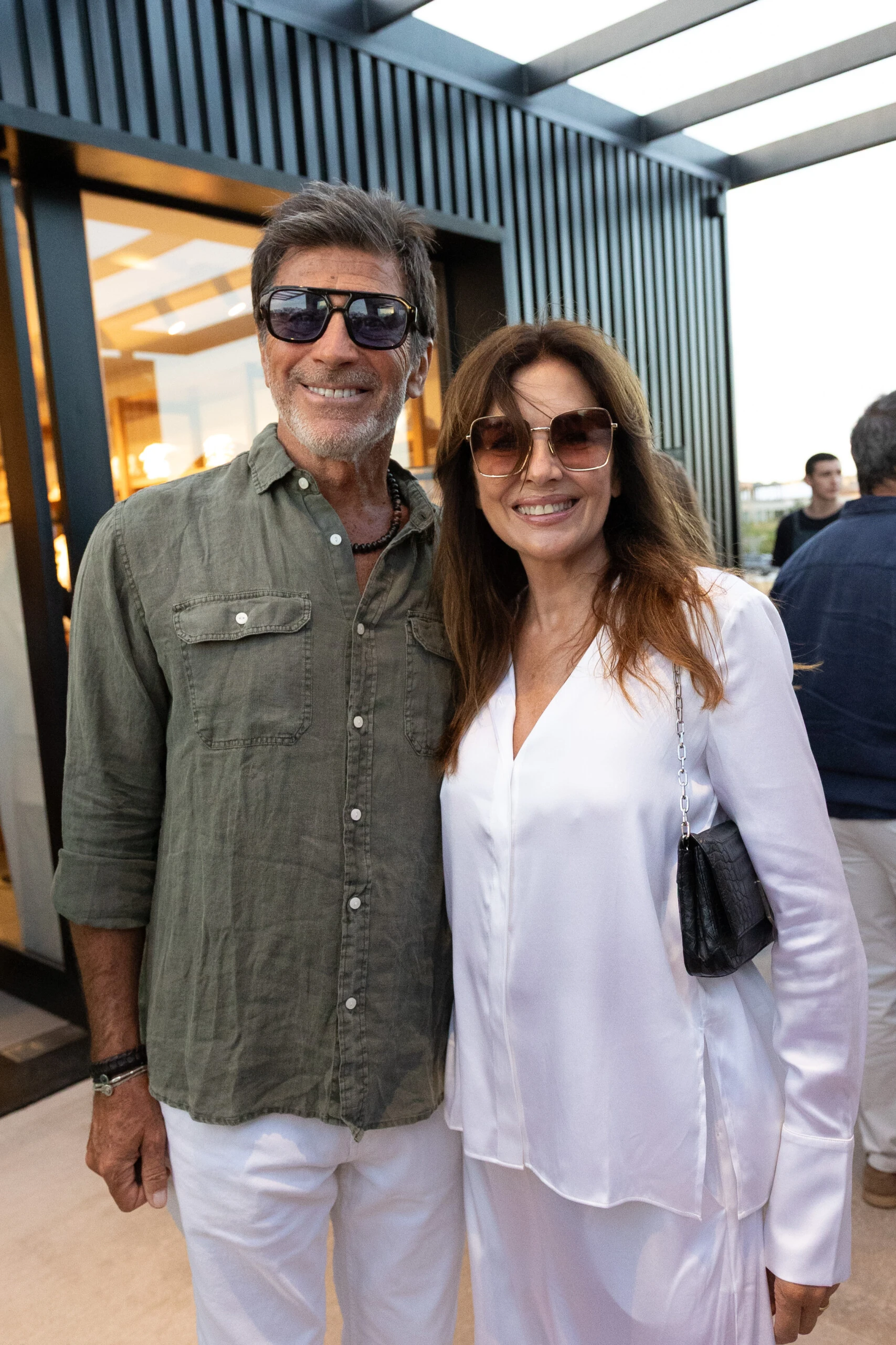 Nico Repetto y Andrea Frigerio en la apertura de la tienda de Etiqueta Negra, Pulenta Estate y Porsche en José Ignacio