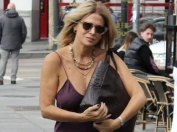 Flavia Palmiero apostó al slip dress y lo combinó con prendas comfy: look urbano y elegante