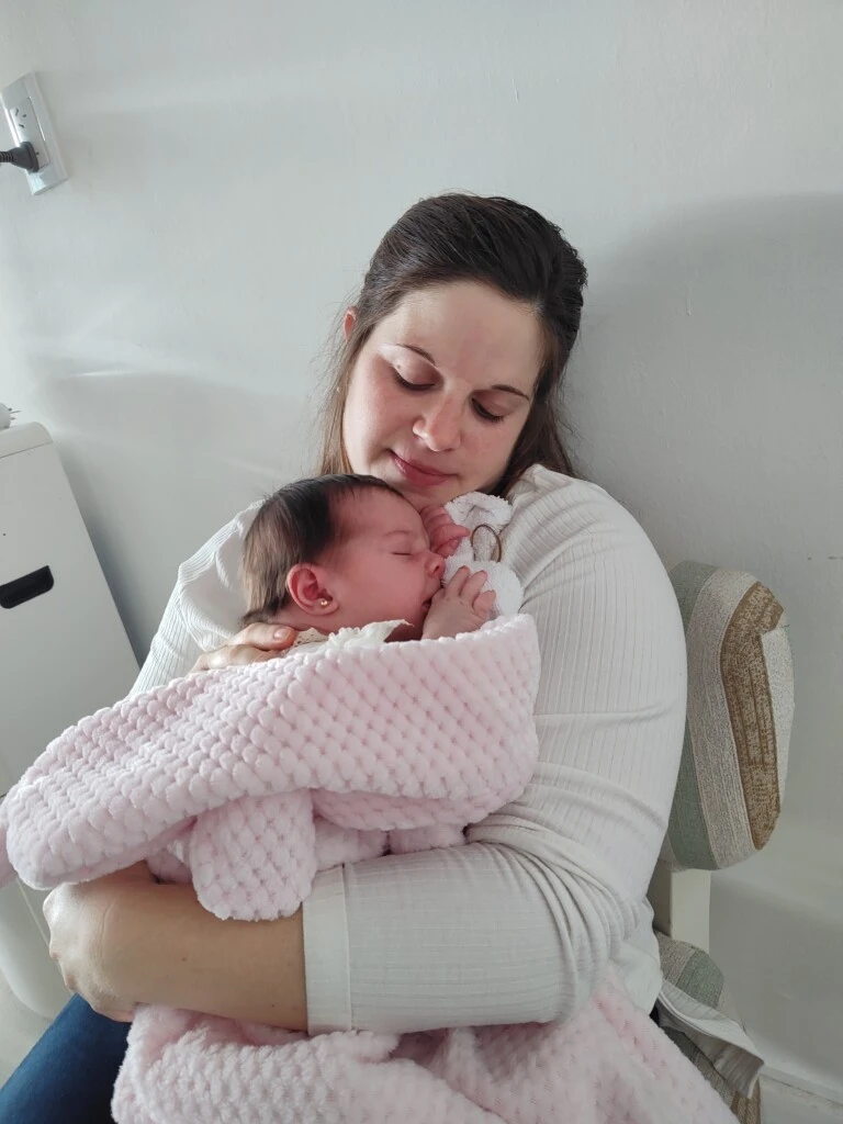 Flor con Aurora de recién nacida