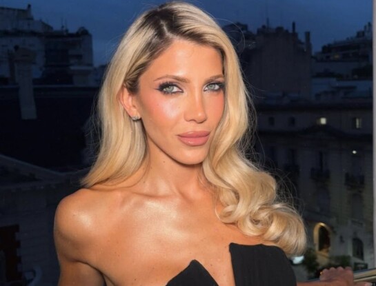 Cande Ruggeri apostó al glamour con un vestido negro strapless para el desfile de Pucheta-Paz
