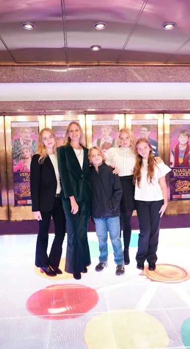 Carola del Bianco y sus hijos.