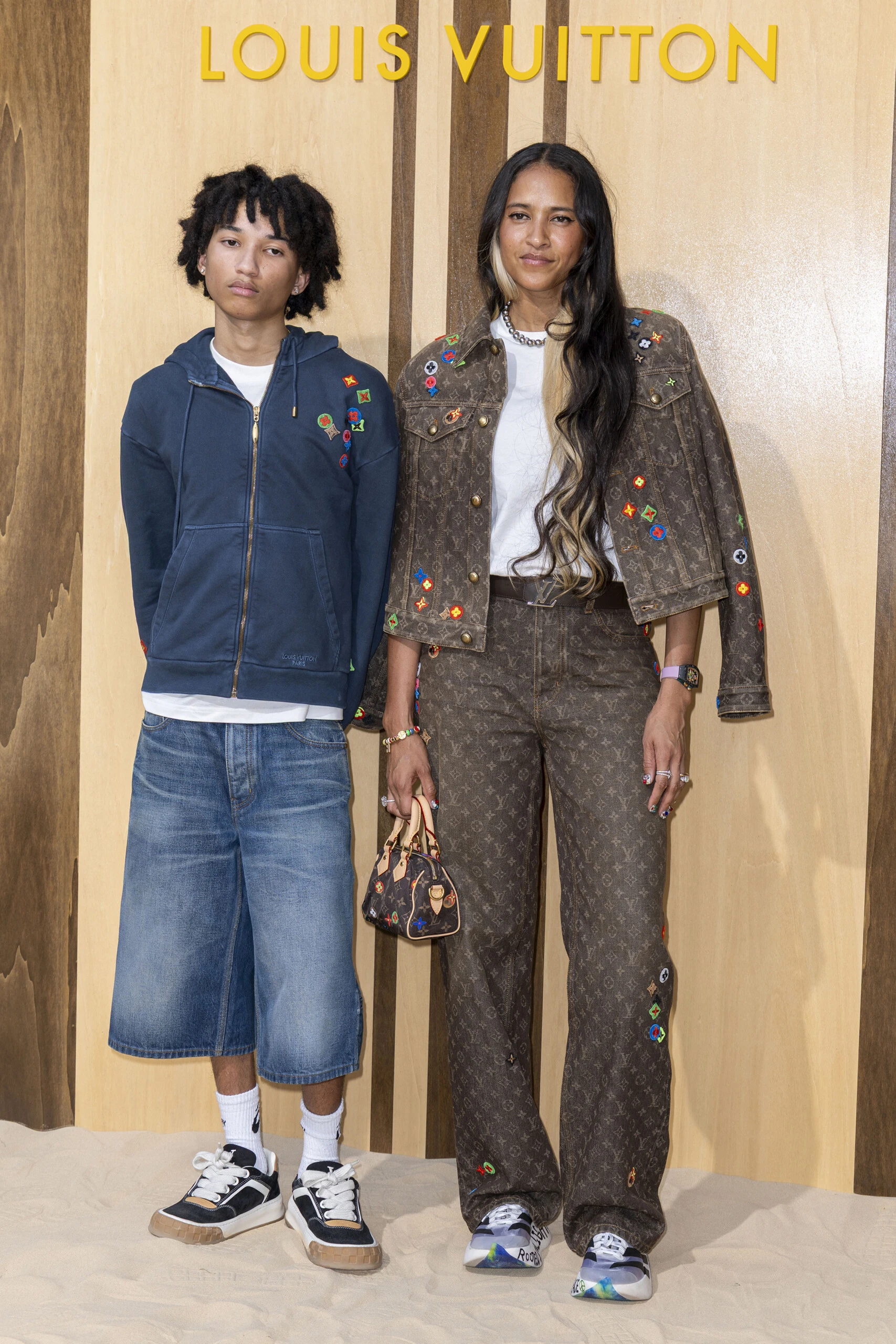 Rocket Williams y Helen Lasichanh en el desfile de Dior.