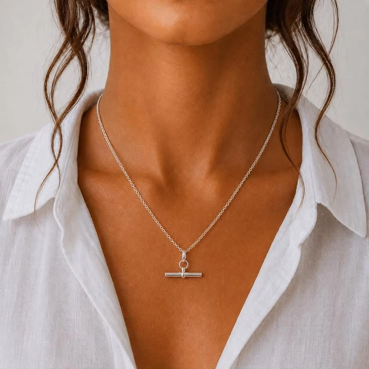 Collar con barra en T