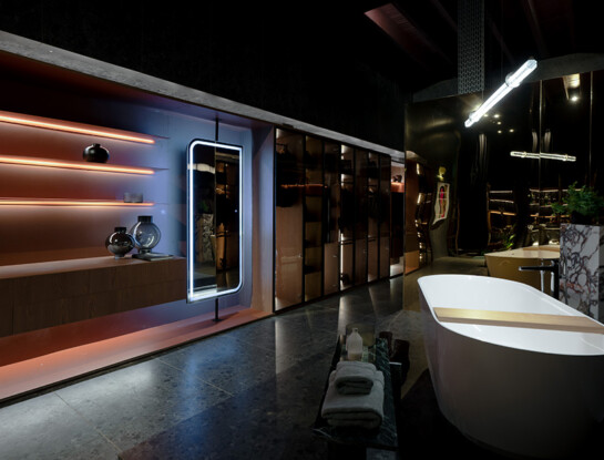 Casa FOA 2026: un baño con vestidor donde los tonos oscuros y el color crean una escena sofisticada